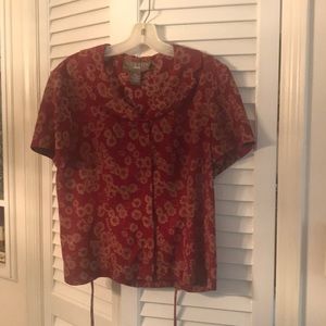 Vintage blouse  with flower detail.